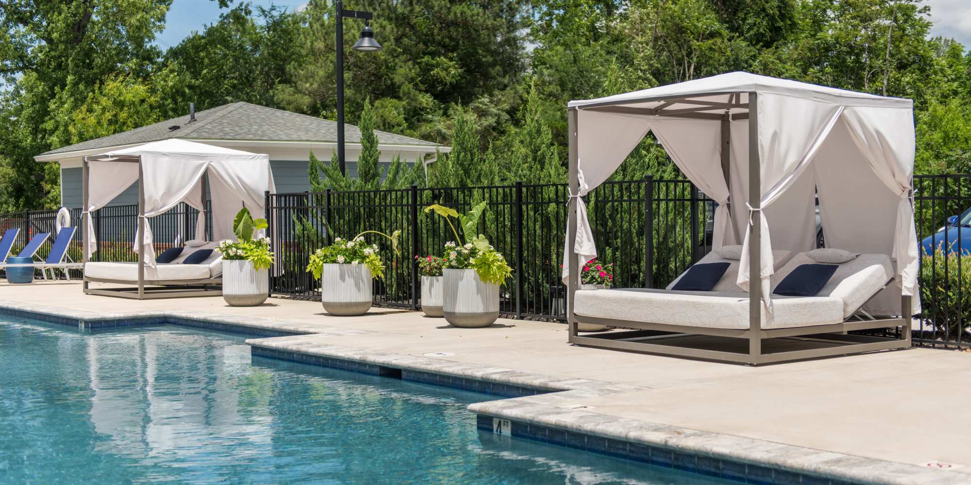 Swimming pool and outdoor patio at Commonwealth Apartments in Midlothian, Virginia