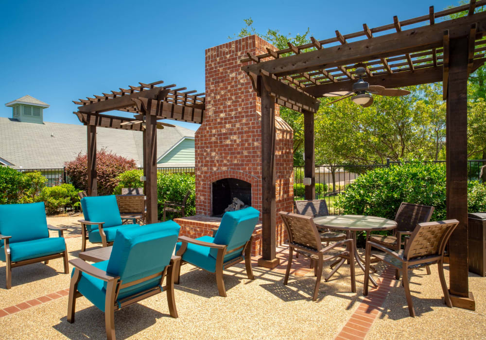 Lounging area outdoors on a sunny day at Sunstone Village in Denton, Texas