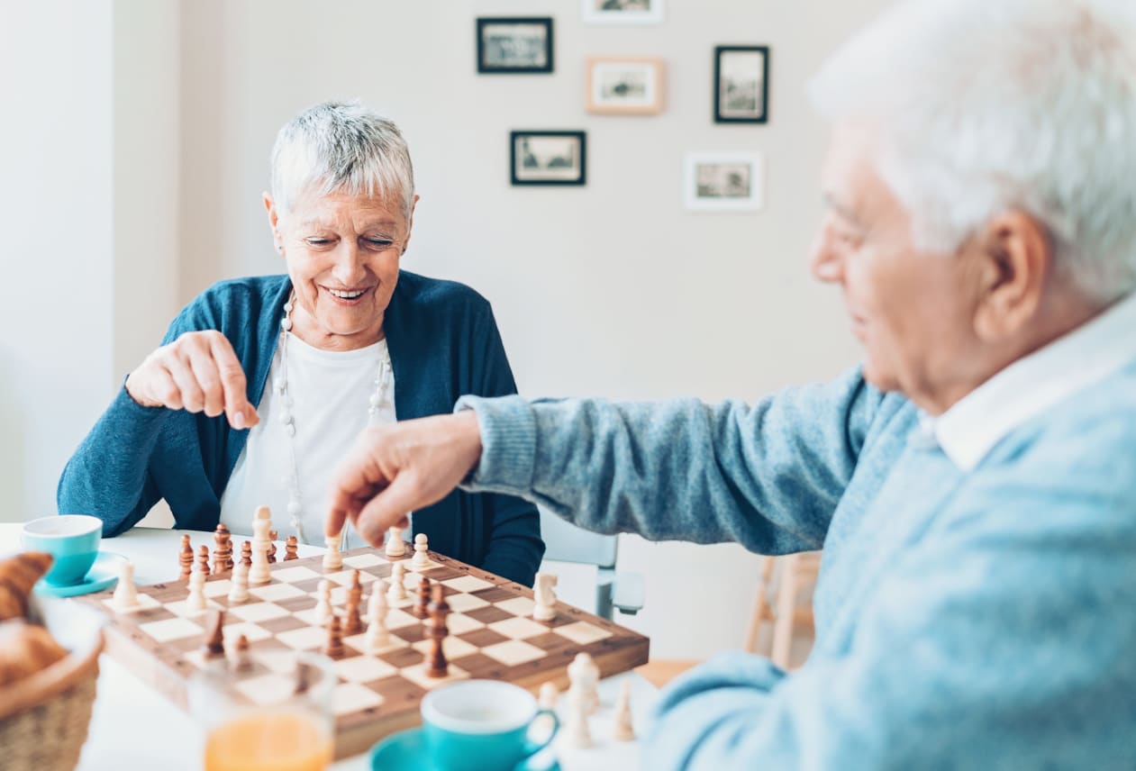 Residents Playing chess at Wood Haven Senior Living in Tewksbury, Massachusetts