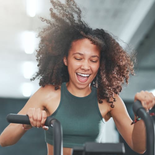 Resident working out at the fitness center at Victoria Station in Victoria, Texas