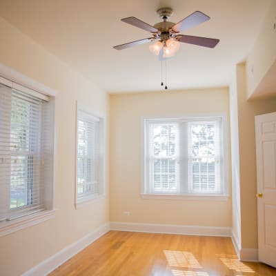 A bright bedroom in a home at Perry Circle Apartments in Annapolis, Maryland