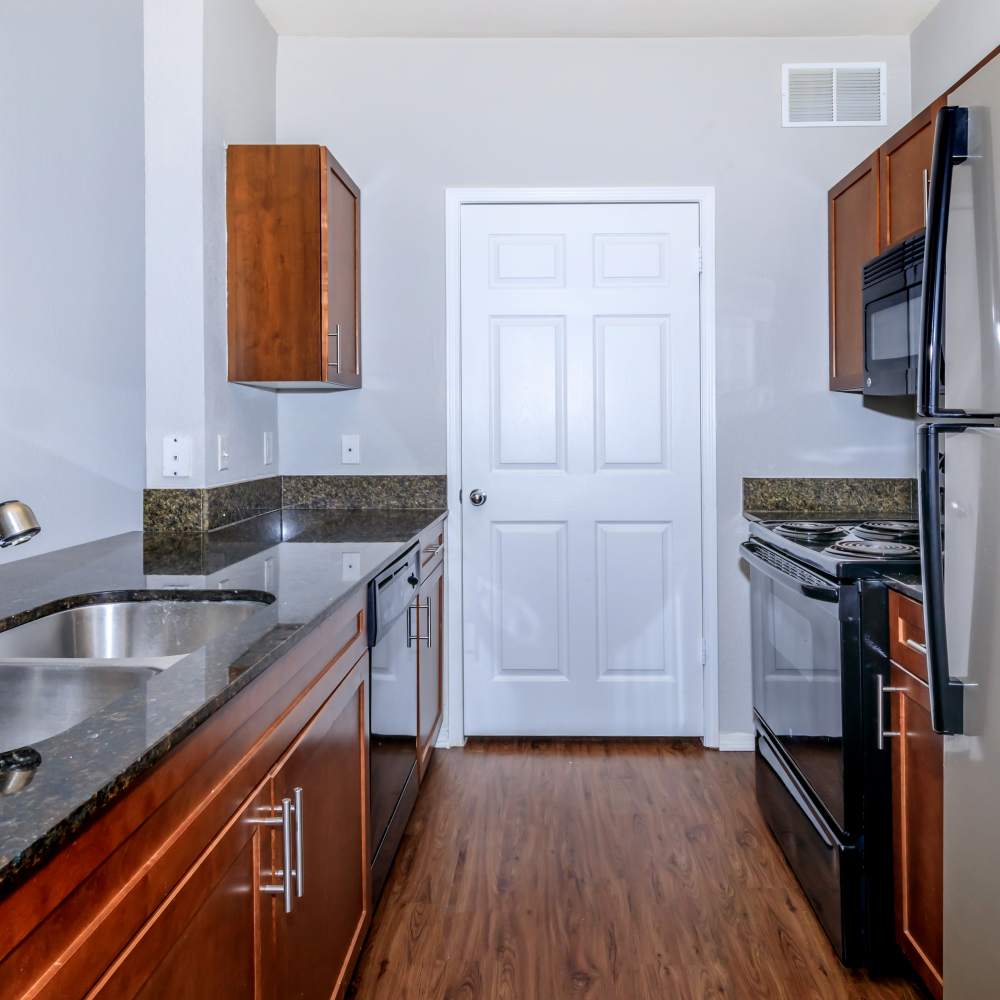 Kitchen with appliances at One Belmar Place in Lakewood,Colorado