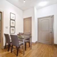 Dining area with wood-style flooring at Grapevine Station in Grapevine, Texas