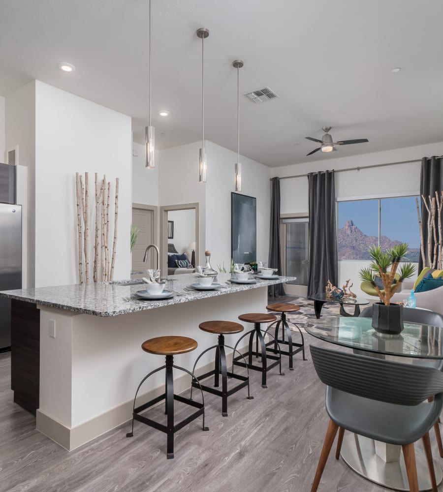 Modern kitchen with granite counter tops at The District at Scottsdale in Scottsdale, Arizona