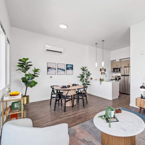 Living room with access to the dinning space of an apartment at Allegro in Lynnwood, Washington 