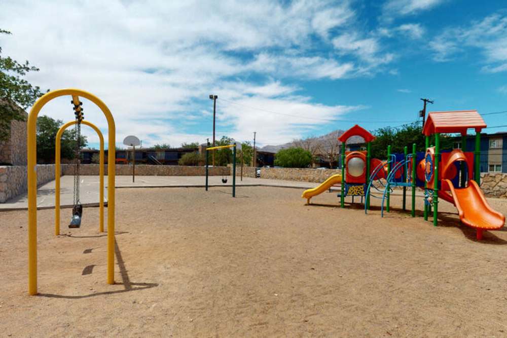 Playground with swing at Agave Courtyard in El Paso, Texas 