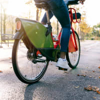 A resident riding their bike near Astoria in Mobile, Alabama