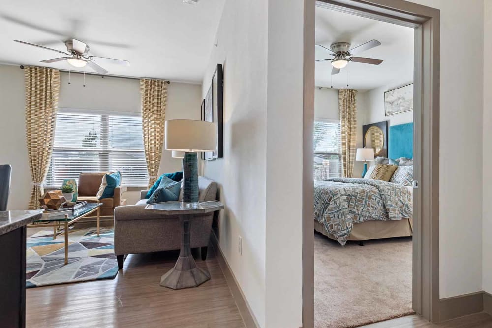 Living room and bedroom at The Residences at Panther Hollow in Marble Falls, Texas