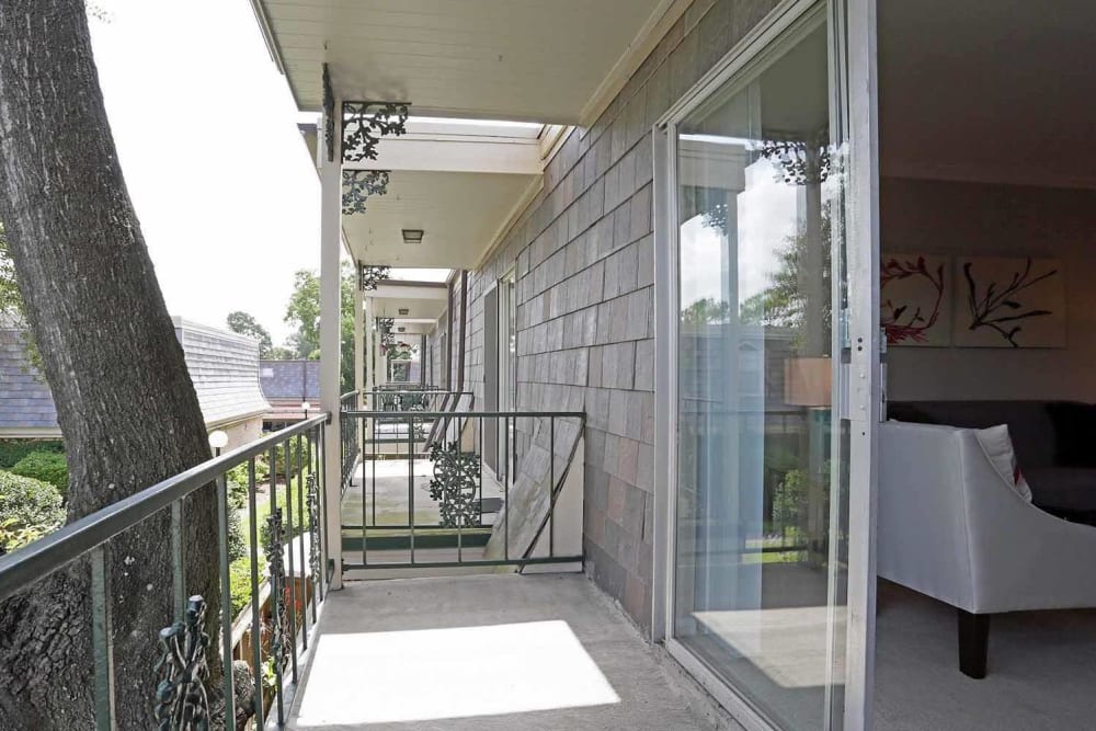 An apartment home balcony at Brittany Place Apartments in Houston, Texas