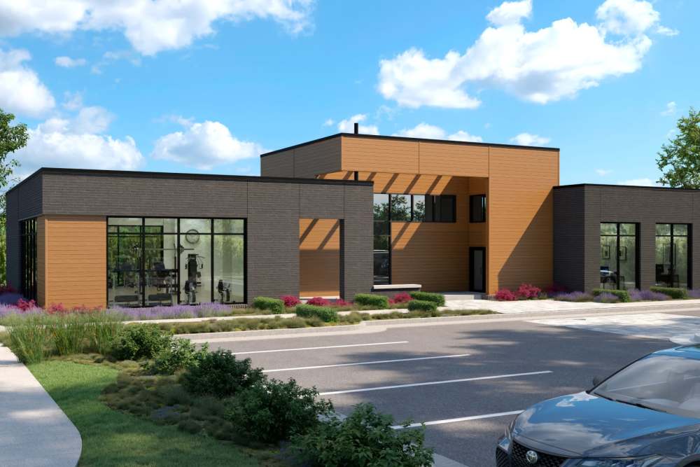 Clubhouse exterior and community entrance at MainLine Apartment Homes in Fredericksburg, Virginia
