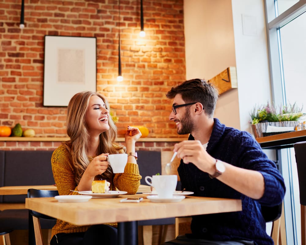 A couple having coffee near Lyman Park in Quantico, Virginia