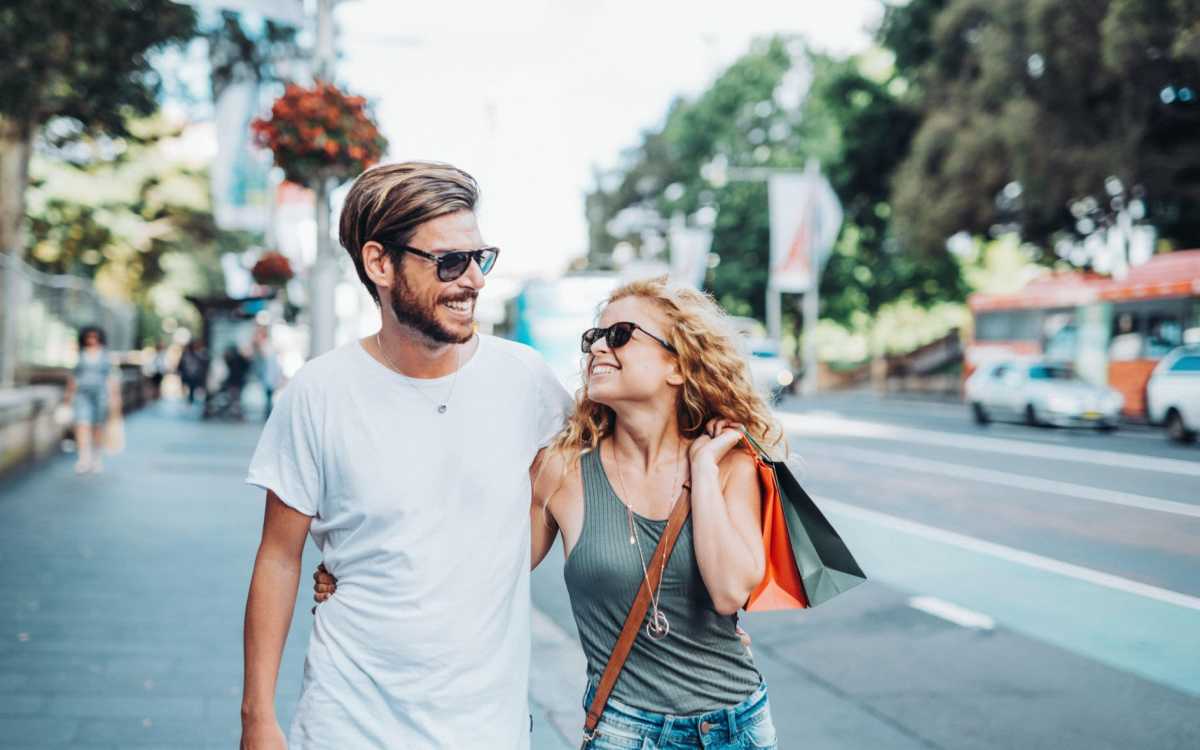 Resident walking their dog through a park near Wendover At Meadowood in Greensboro, North Carolina 
