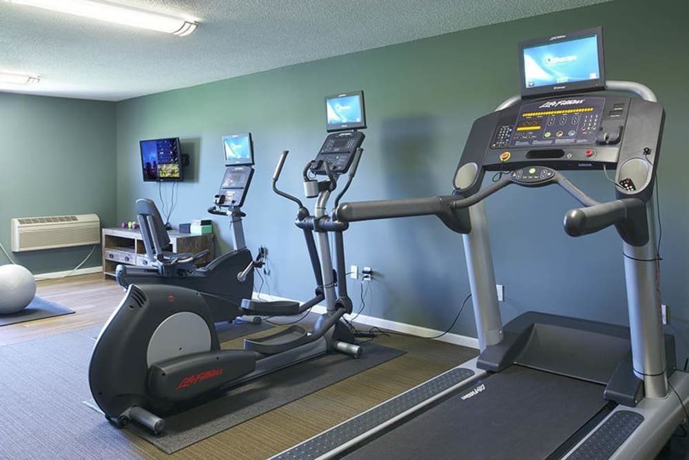 A spacious community gym at The Barrington in Woodbury, Minnesota