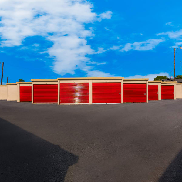 Outdoor storage units with wide driveways at StorQuest Self Storage in Fort Worth, Texas