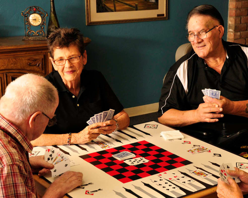 Seniors playing card games at Villa Maria Care Center in Tucson, Arizona