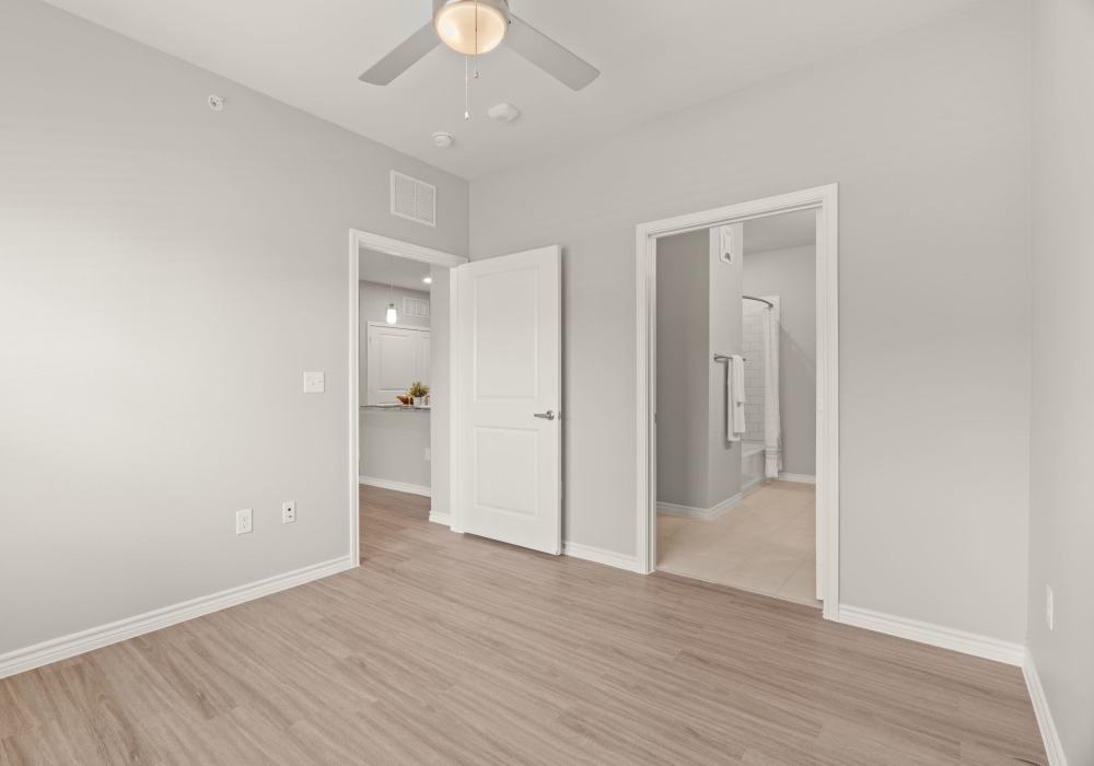 Spacious bedroom with ceiling fan at Walnut Springs in Seguin, Texas