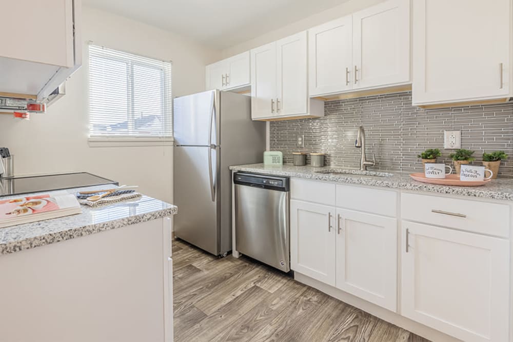 Fully-equipped kitchen at Waverlywood Apartments & Townhomes in Webster, New York