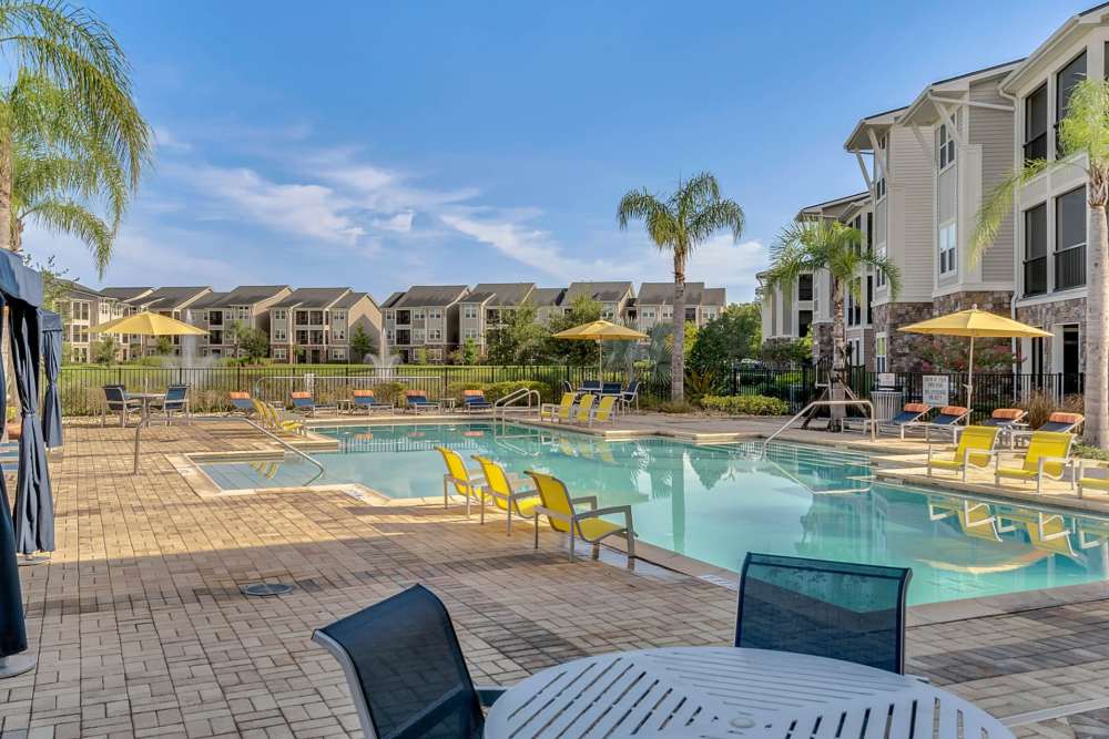 Luxury inground pool at Art Avenue Apartment Homes in Orlando, Florida