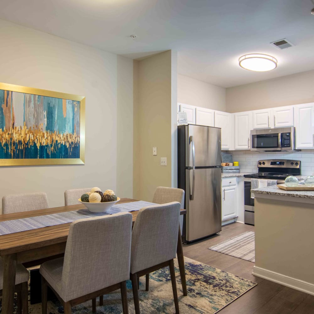 Room with painting next to kitchen at River Forest in Chester, Virginia