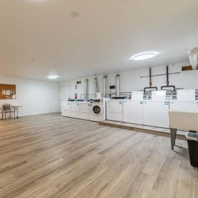 very large on site laundry room at Pinnacle Apartments in Fife, Washington