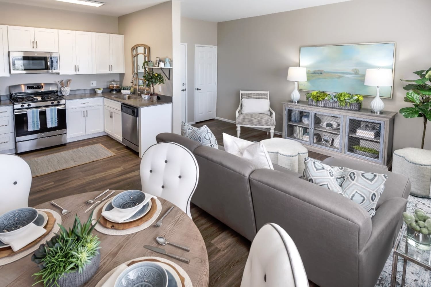 Well appointed kitchen, dining room and living room at Madrid Apartments in Mission Viejo, California