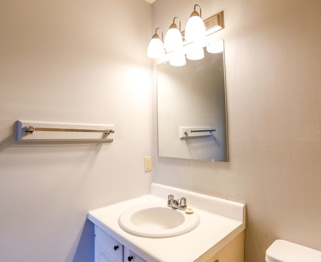 An apartment bathroom at Meadowbrook and Brookridge in Charlotte, North Carolina