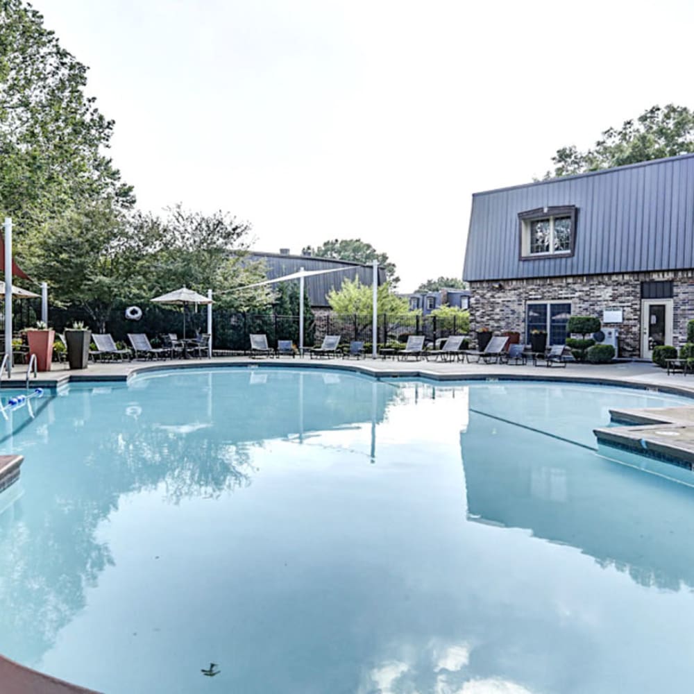 Large swimming pool outside resident clubhouse at London House Apartments in Lenexa, Kansas