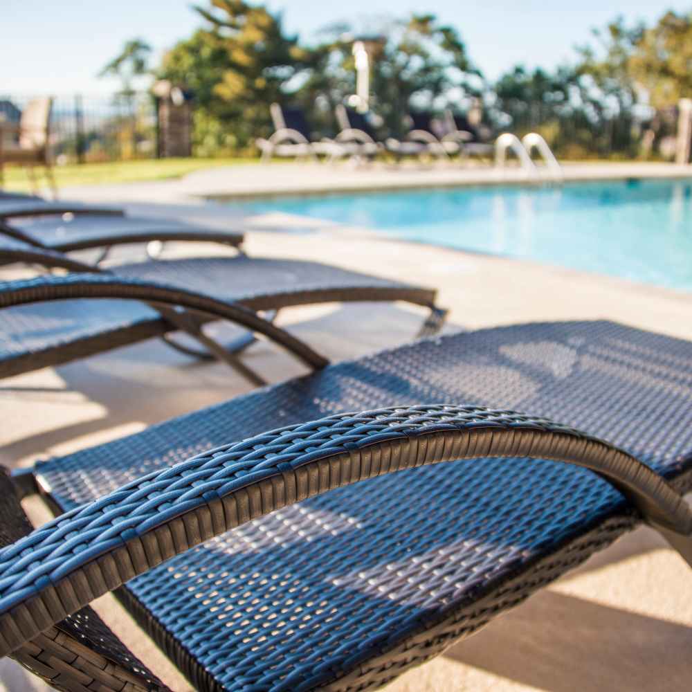 Lounge by our swimming pool at Retreat at Hunt Hill in Asheville, North Carolina