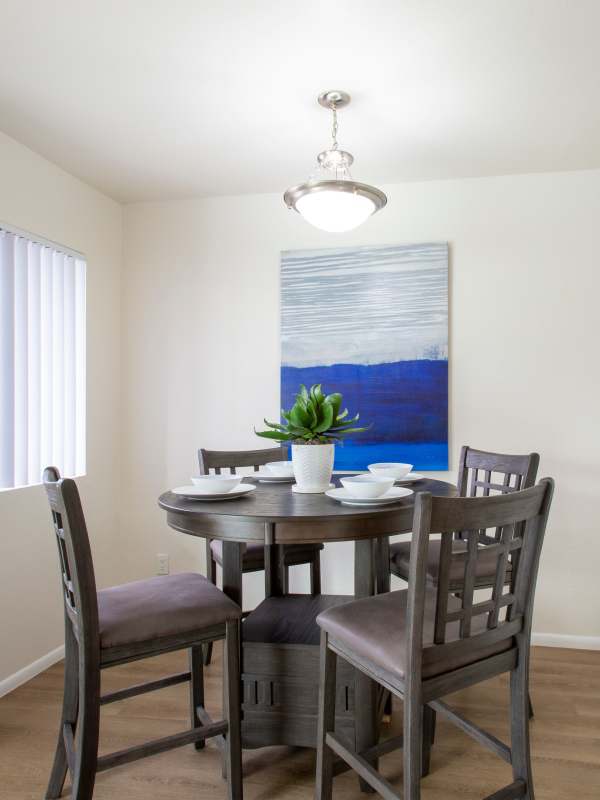 Dining area in the apartment with high ceilings at Midtown on Seneca in Tucson, Arizona