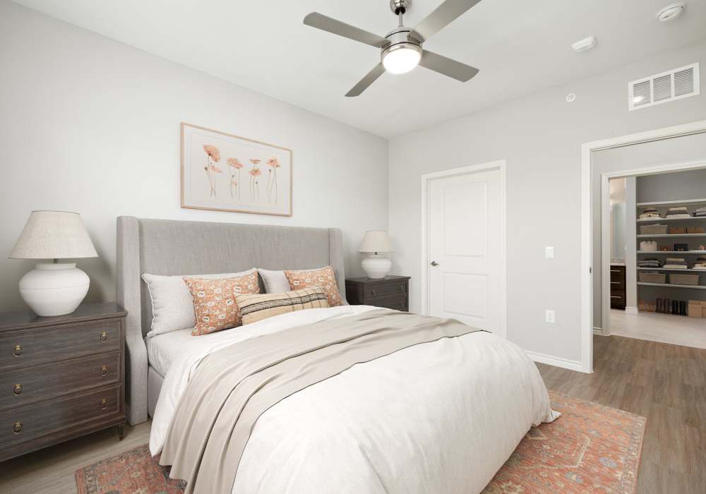 Cozy bedroom with queen bed at Redwood in San Marcos, Texas