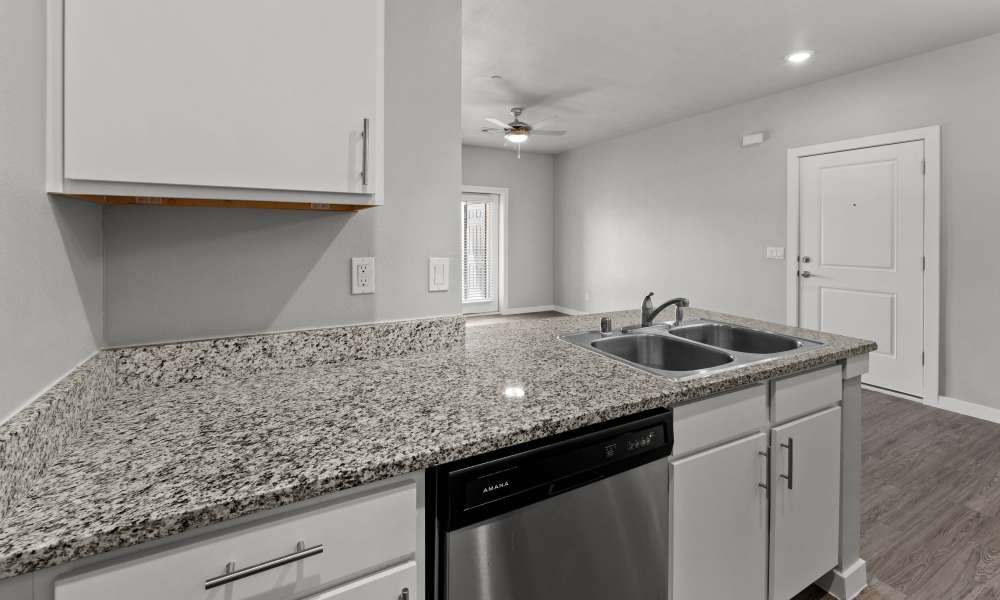 Kitchen with granite countertop at Retreat at Horizon Hills in El Paso, Texas