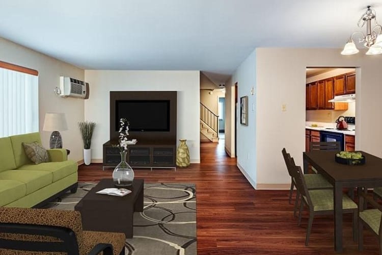 Spacious living room at Maiden Bridge & Canongate Apartments in Pittsburgh