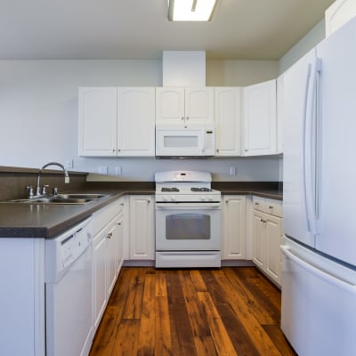 A home with an open kitchen at Harborview in Oceanside, California