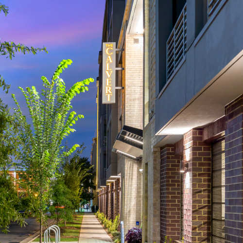 An apartment surrounded by trees at The Calvert in Charlotte, North Carolina