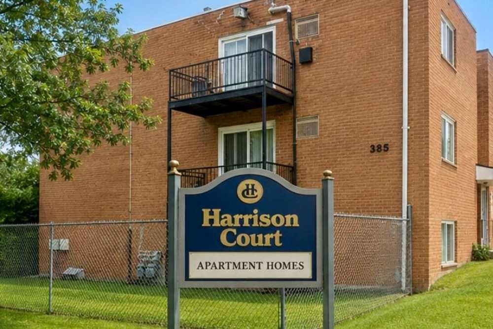 Exterior building with community sign at Stonehurst Manor and Harrison Court in Upper Darby Township, Pennsylvania
