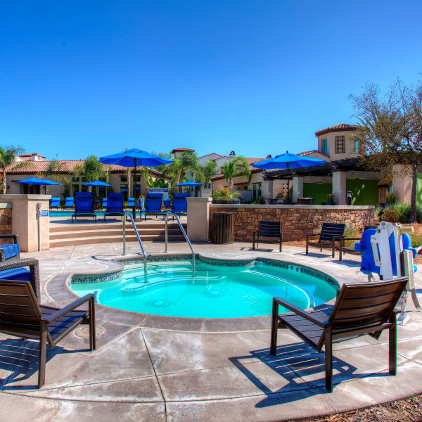 Beautiful view of resort-style spa and bright blue sky at Palisades Sierra Del Oro in Corona