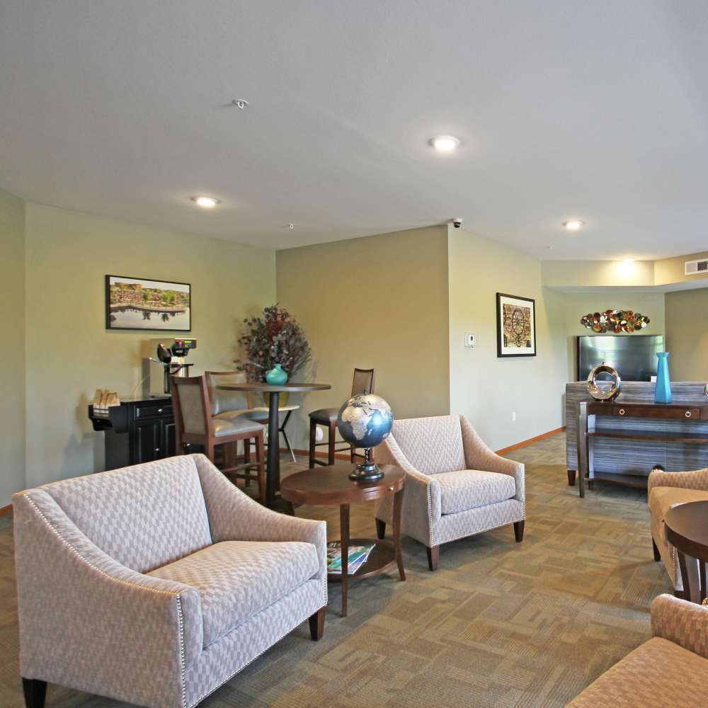 Clubhouse with sofa at Parkview East in Ramsey, Minnesota