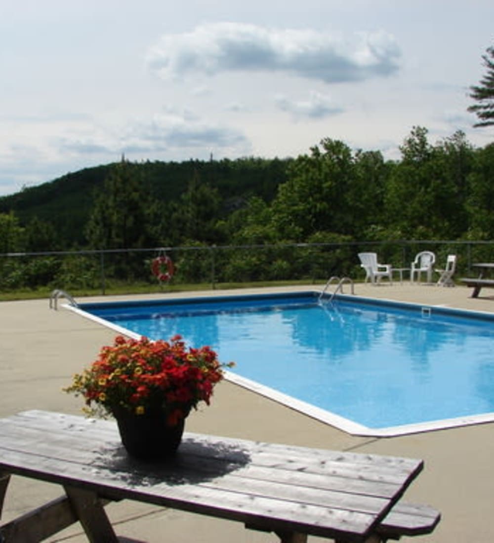 Sparkling swimming pool at Branch River Apartments in Raymond, New Hampshire