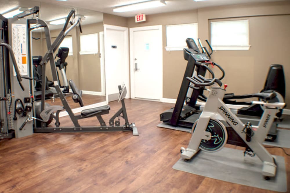 Fitness center with individual workout-stations at Laurel Pines Apartments in Richmond, Virginia