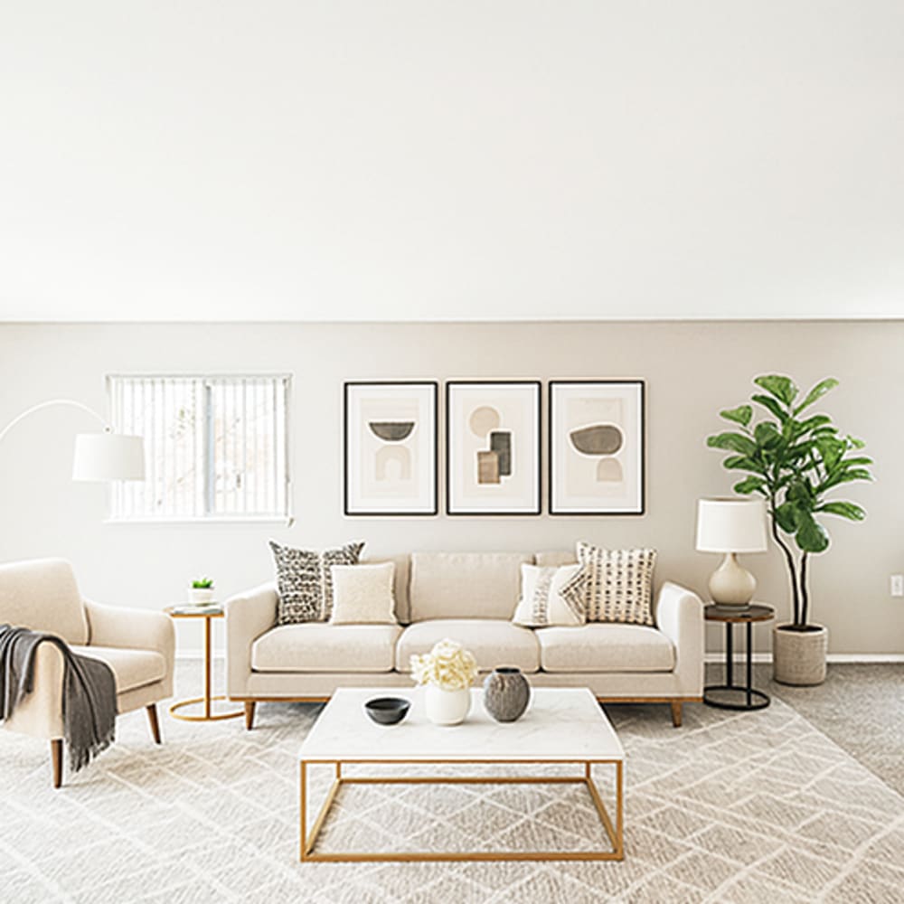 Bright living room with modern decor at 83 West Townhomes in West Bloomfield Township, Michigan
