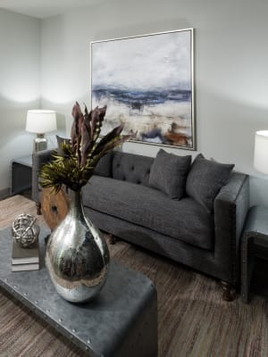 Model living room with open floor concept at Anatole at the Pines in Conroe, Texas