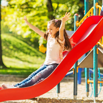 A child playing on the playground at Albany Hill Village in Albany, Georgia