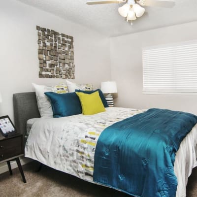 Bright bedroom with a nice ceiling fan at Sofi Belmar in Lakewood, Colorado