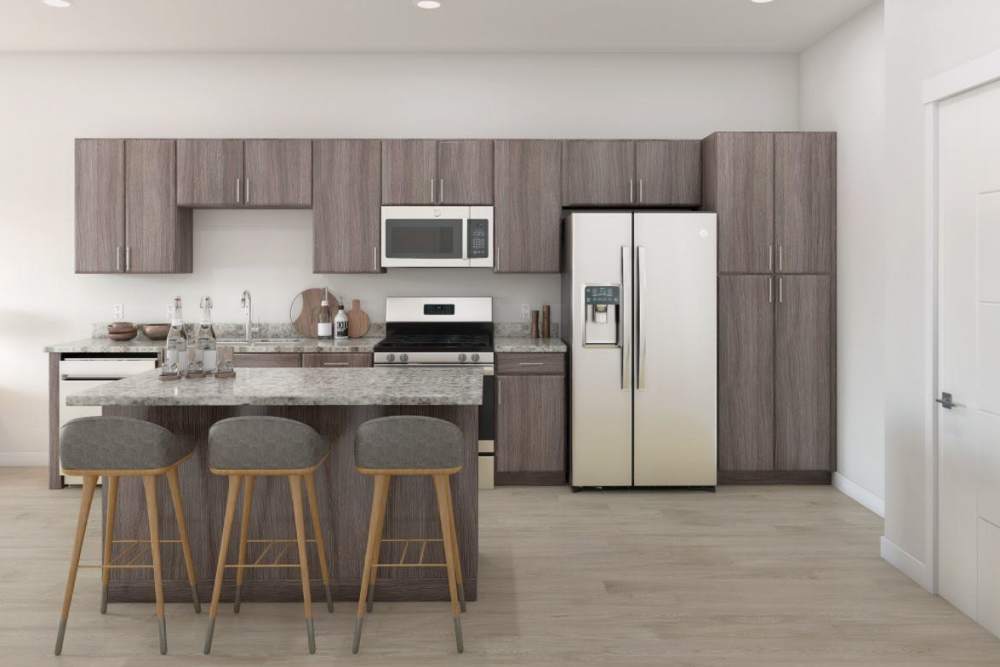 Lots of cabinet space, and stainless appliances in this kitchen at The Hardison in Salt Lake City, Utah