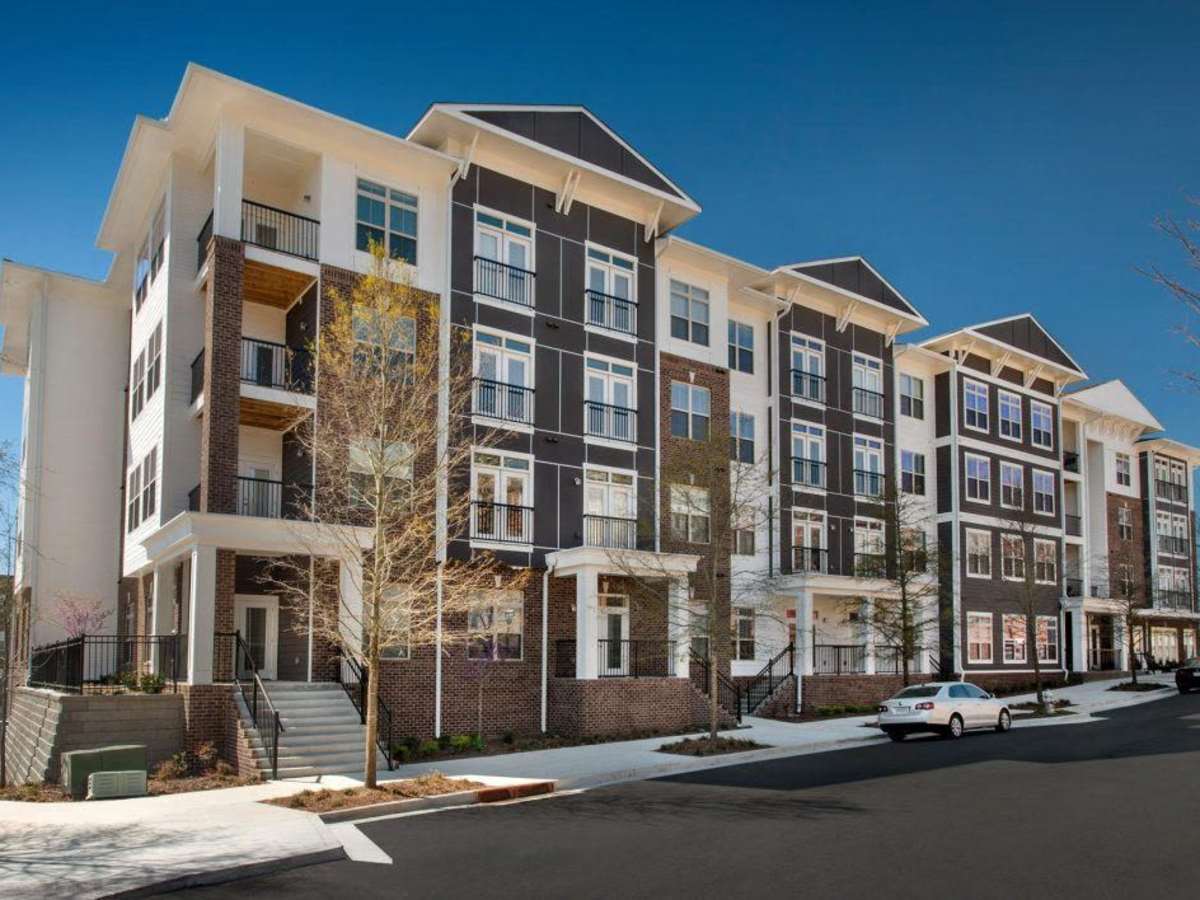 Luxury brick and white exterior with balconies at Ardmore & Twenty Eighth in Atlanta, Georgia