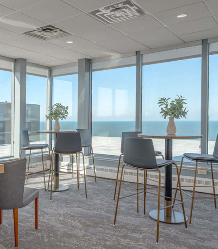 Clubhouse with common seating area with beautiful sea view at 12000 Edgewater in Lakewood, Ohio