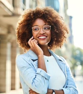 Woman loving her neighborhood at Azure Apartment Homes in Petaluma, California