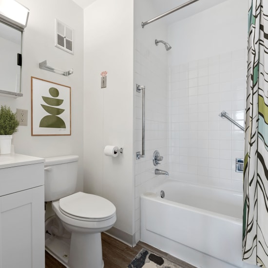 Updated bathroom with tile bath and grab bars John Sale Manor in Xenia, Ohio