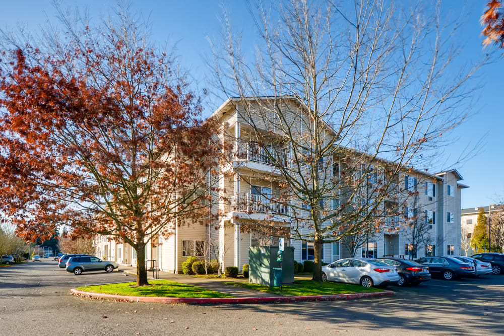 Exterior and parking lot at Vancouver Pointe senior community in Vancouver, Washington.