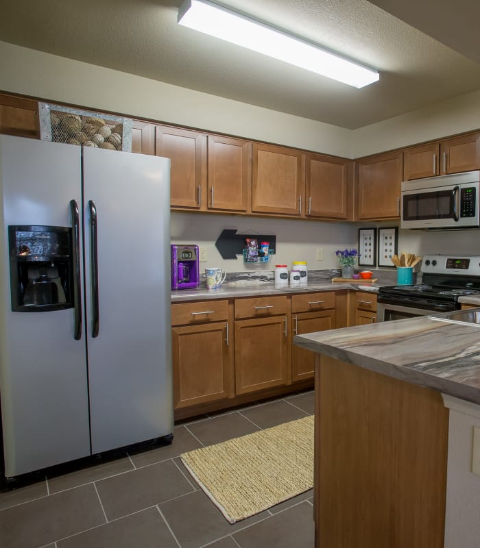 Kitchen with granite countertops at Portofino Apartments in Wichita, Kansas